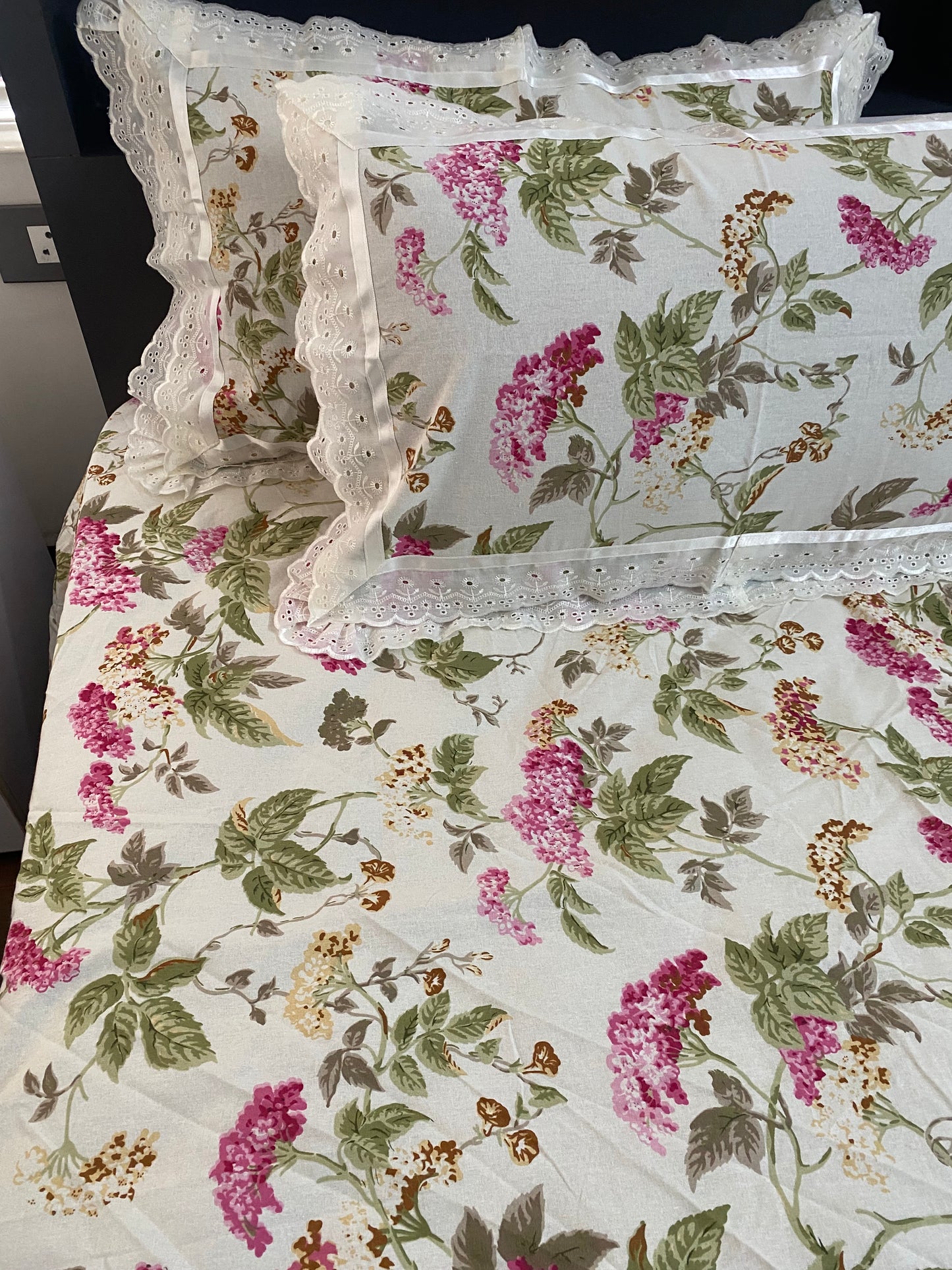 Fitted king size bedsheet with lace detailing on pillow